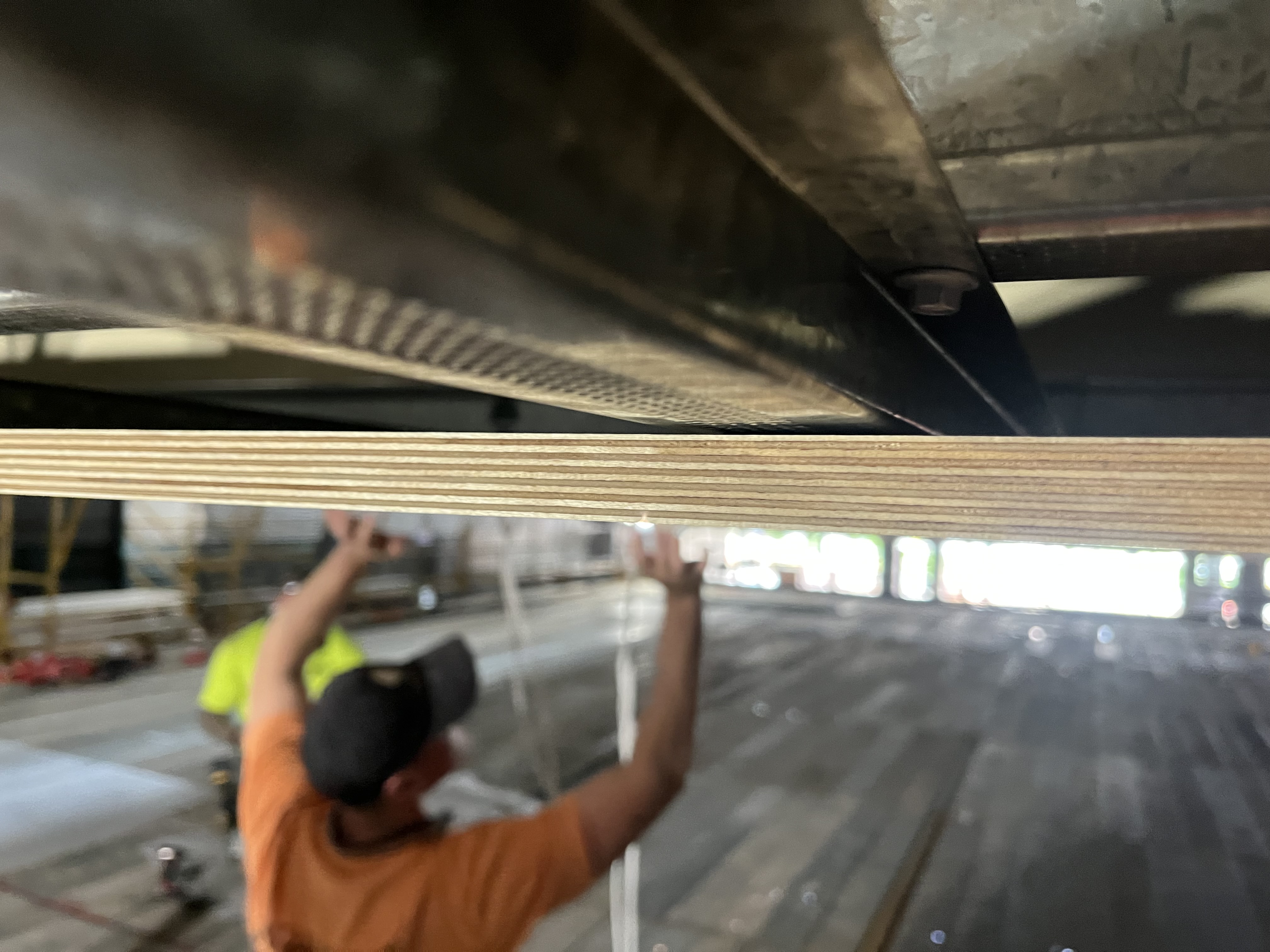 Tec7 adhesive bonding metal bracket to plywood demonstrating adhesion and cohesion